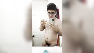 21yo boy peeing in a transparent cup, and drinks his own pee (in front of the mirror) - 14 image