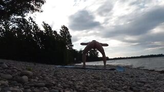 Slender nudist boy does yoga nude on a naturist beach. Naked yoga video by Jon Arteen gay porn model - 13 image