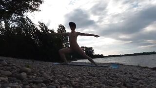 Slender nudist boy does yoga nude on a naturist beach. Naked yoga video by Jon Arteen gay porn model - 14 image