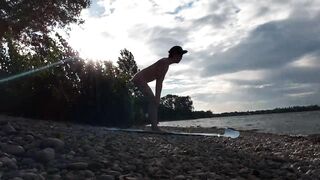 Slender nudist boy does yoga nude on a naturist beach. Naked yoga video by Jon Arteen gay porn model - 4 image
