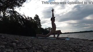 Slender nudist boy does yoga nude on a naturist beach. Naked yoga video by Jon Arteen gay porn model - 7 image