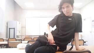 Cum at school, this horny student twink wanks his smooth cock and squirts jizz riskyly at school in a classroom on classmate desk, Jon Arteen jerks off at university, making a hot solo gay porn video - 13 image