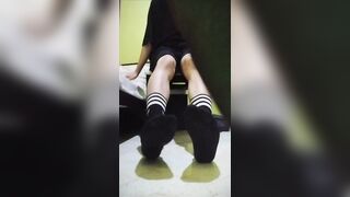 Twink teen boy showing his dirty stinky black socks - 1 image