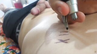 Tattooing his own cock with a needle and homemade machine. - 14 image