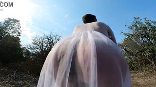 Sunbathing, squatting and masturbating in a public place wearing a sheer robe - 13 image