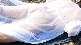 Sunbathing, squatting and masturbating in a public place wearing a sheer robe - 2 image