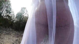 Sunbathing, squatting and masturbating in a public place wearing a sheer robe - 5 image