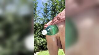 In the woods with a bottle in my ass