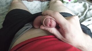 The guy strokes his dick through black shorts and pulls out a dick - 11 image