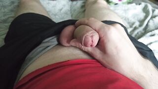 The guy strokes his dick through black shorts and pulls out a dick - 13 image