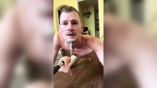 Faggot gags and spits on deep throat fuck machine dildo - 1 image