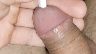 High-voltage charging plugged into the boy's cock makes him horny.