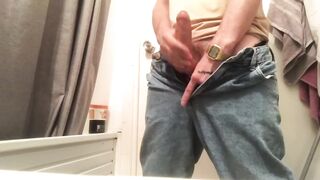 A guy in jeans jerked off his dick and cummed - 12 image