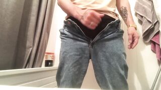 A guy in jeans jerked off his dick and cummed - 5 image