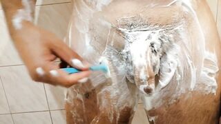 The guy has fun in the shower with his cock - 14 image