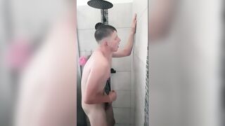 fit lad wanking in the shower - 1 image