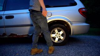Wild man with bladder full of piss painting the parking lot with juice from his penis - 1 image