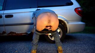 Wild man with bladder full of piss painting the parking lot with juice from his penis - 2 image