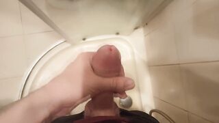 The guy masturbates his dick standing in the shower and cums - 11 image