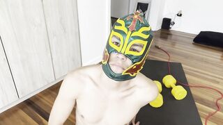 Latin gay guy models his mask and makes a spectacular show