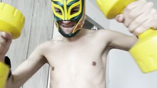 Latin gay guy models his mask and makes a spectacular show