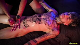 Camilo Brown Giving an Intense Oil Handjob To Hot Tattooed Twink Inked Mike - 1 image