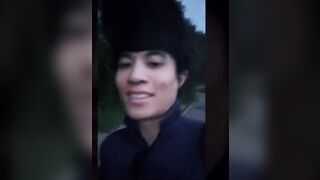 Cute gay Asian twink Jon Arteen speaks French, masturbates his smooth penis in the rain, lubricated with his saliva, moans, ejaculates sticky cum on his fingers - 1 image