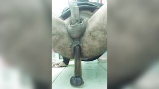 Heterocurious cums with dildo in the anus