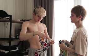 Two studs pound their cute twink pal's tight ass with their monster cocks