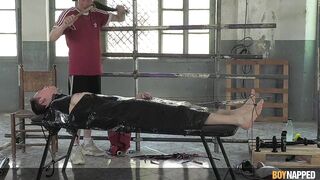 Watch young man dominated & boynapped by a kinky femdom in Part 2 of Twink's barefoot foot fetish adventure - 11 image