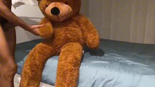 Watch this skinny, big-cocked twink bareback his teddy bear with his bare hands - 1 image