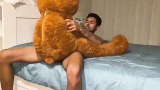 Watch this skinny, big-cocked twink bareback his teddy bear with his bare hands - 11 image