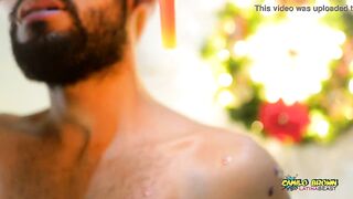 Young Uncut Latino In Colorful Christmas Wax Play With Carols In The Back - 7 image