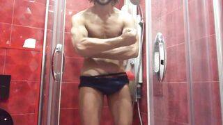 Handsome muscular guy takes a shower and masturbates - 3 image